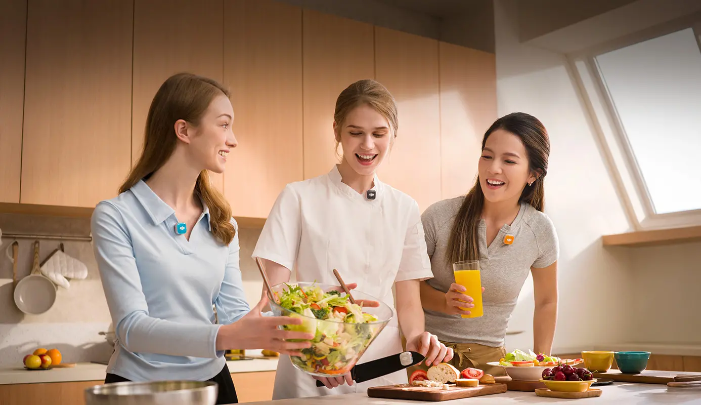Team collaborating around a kitchen counter