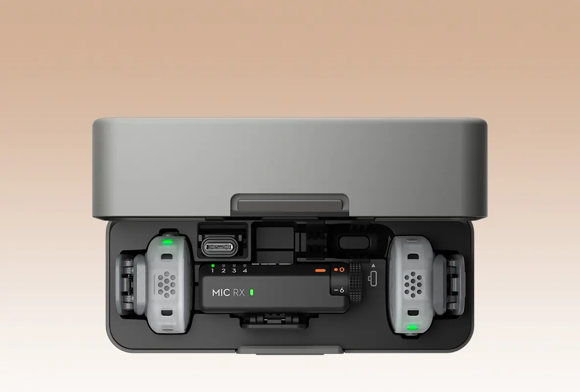 Open charging case showing device internals